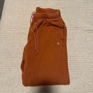 Perfect orange/fall color, Champion brand sweatpants. Cuffed bottoms & so cozy.
